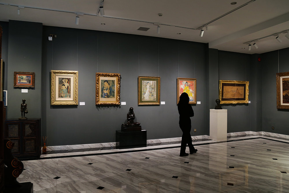 Visitors immerse themselves in the artwork, finding stories woven into every brushstroke 